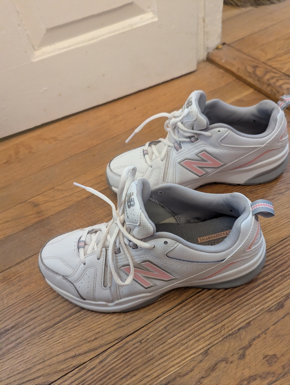 Women's New Balance White and Pink Athletic Sneakers